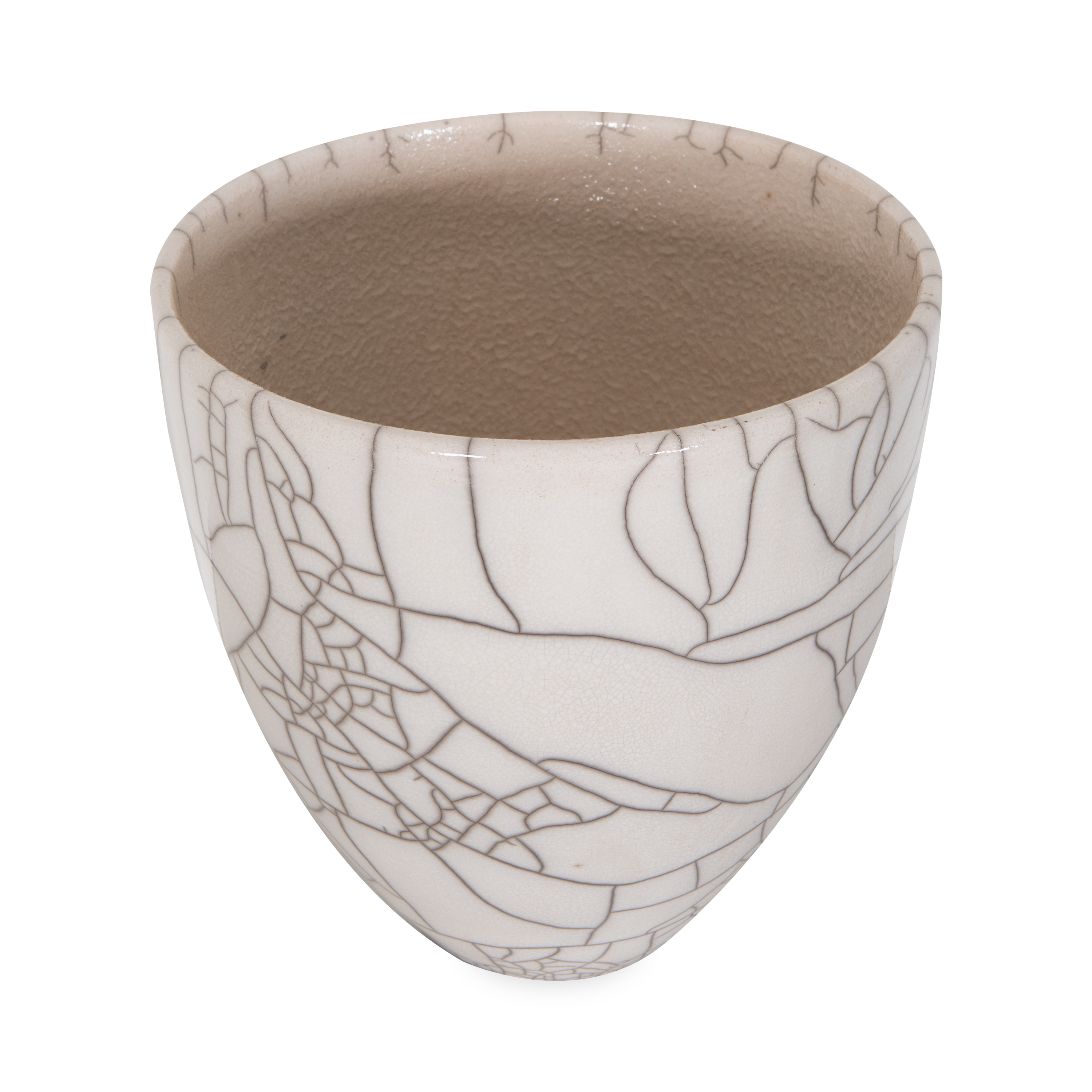 The Raku Planter features a white crackle finish, which is created due to the highly reactive Raku glaze and a low-firing process that involves controlling temperature and deprivin